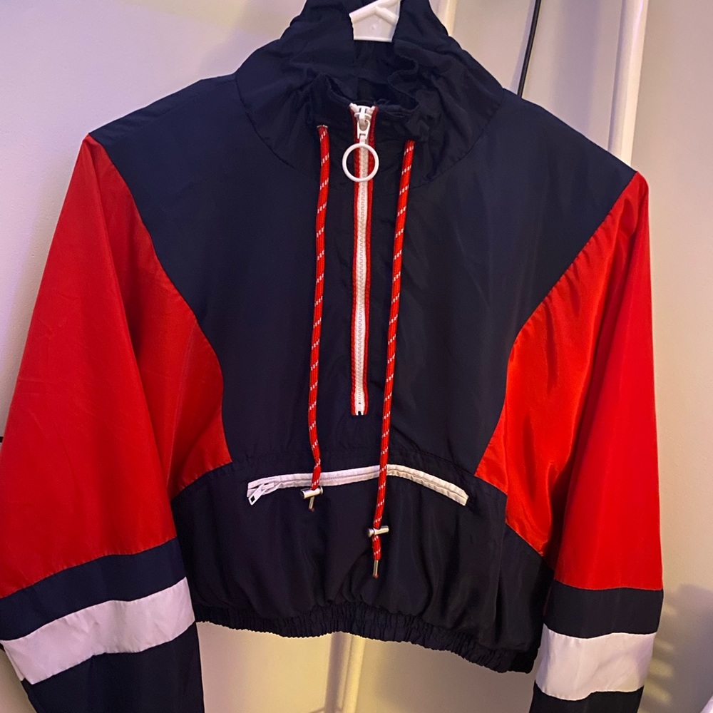 red windbreaker jacket